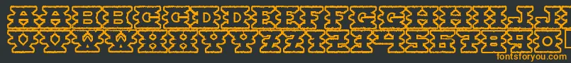Шрифт Montezumaancient – оранжевые шрифты на чёрном фоне
