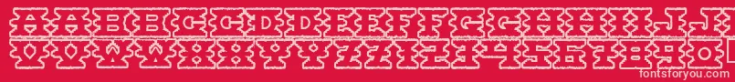 Montezumaancient-Schriftart – Rosa Schriften auf rotem Hintergrund