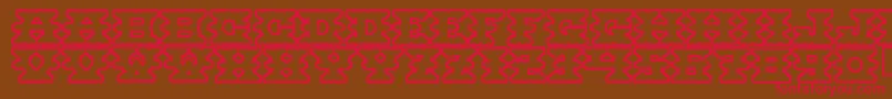 Montezumaancient-fontti – punaiset fontit ruskealla taustalla