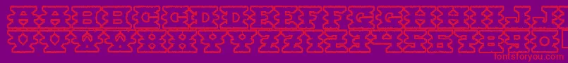 フォントMontezumaancient – 紫の背景に赤い文字