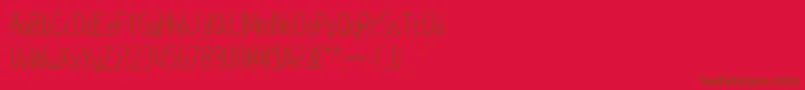 ImWunderland Font – Brown Fonts on Red Background