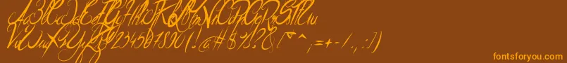 ElegantDragonItalic-Schriftart – Orangefarbene Schriften auf braunem Hintergrund