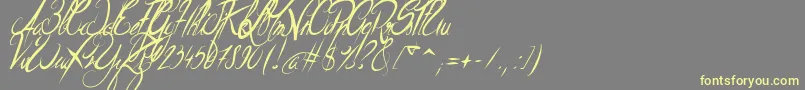 Шрифт ElegantDragonItalic – жёлтые шрифты на сером фоне