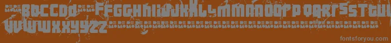Saiba mais sobre a fonte Ft3thehardwayrmxmesseddemo Fonte Ft3thehardwayrmxmesseddemo – fontes cinzas em um fundo marrom