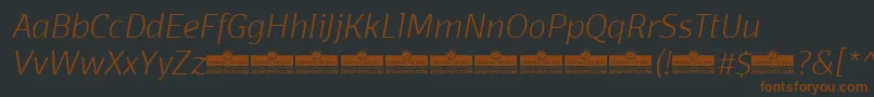 DomotikaExtralightItalicTrial-fontti – ruskeat fontit mustalla taustalla