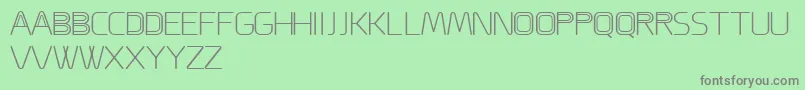 ACappella-fontti – harmaat kirjasimet vihreällä taustalla