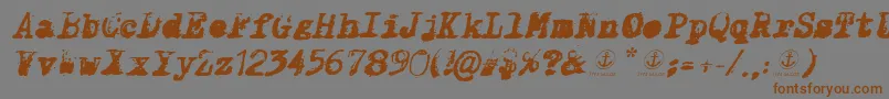 Czcionka XClassifiedItalic – brązowe czcionki na szarym tle