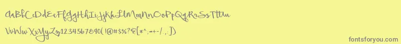 フォントBeautifulMess – 黄色の背景に灰色の文字