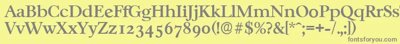 CasablancaserialMediumRegular-Schriftart – Graue Schriften auf gelbem Hintergrund