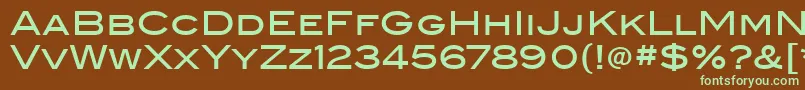 フォントBlairItcMedium – 緑色の文字が茶色の背景にあります。