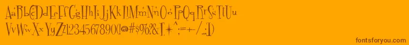 Fontdinerdotcom Sparkly Font – Brown Fonts on Orange Background