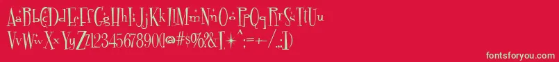 Fontdinerdotcom Sparkly Font – Green Fonts on Red Background