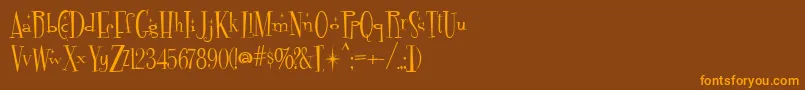 Fontdinerdotcom Sparkly Font – Orange Fonts on Brown Background