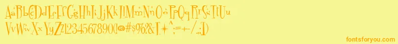 Fontdinerdotcom Sparkly Font – Orange Fonts on Yellow Background