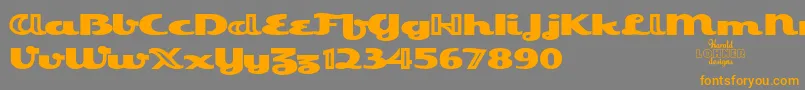 フォントEsquivelTrial – オレンジの文字は灰色の背景にあります。
