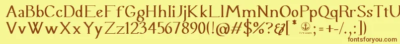 フォントUraniaSerif – 茶色の文字が黄色の背景にあります。