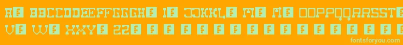 FatCowboy-Schriftart – Grüne Schriften auf orangefarbenem Hintergrund