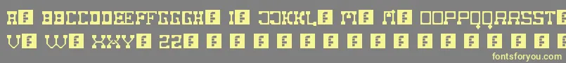 FatCowboy Font – Yellow Fonts on Gray Background