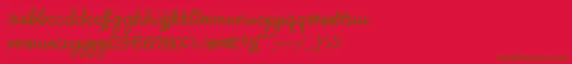 LightheartScript-Schriftart – Braune Schriften auf rotem Hintergrund