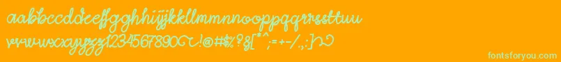 LightheartScript-Schriftart – Grüne Schriften auf orangefarbenem Hintergrund