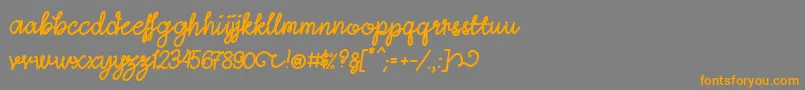 LightheartScript-fontti – oranssit fontit harmaalla taustalla