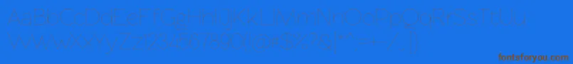 Rawengulkultralight-Schriftart – Braune Schriften auf blauem Hintergrund
