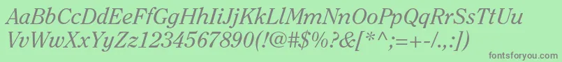 ClearfacestdItalic-fontti – harmaat kirjasimet vihreällä taustalla