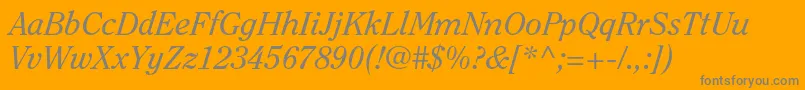 ClearfacestdItalic-fontti – harmaat kirjasimet oranssilla taustalla