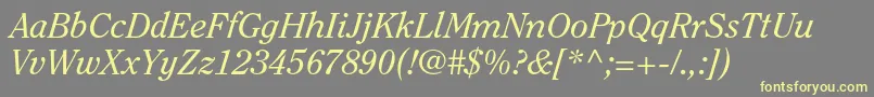ClearfacestdItalic-fontti – keltaiset fontit harmaalla taustalla