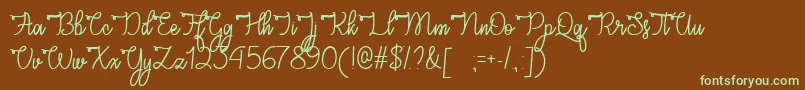 フォントCongratsScriptTtf – 緑色の文字が茶色の背景にあります。
