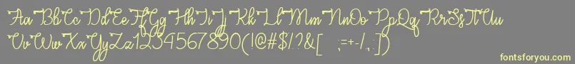 CongratsScriptTtf-fontti – keltaiset fontit harmaalla taustalla