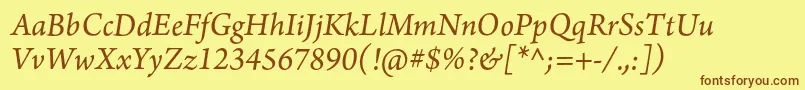 ArnoproItalic10pt-Schriftart – Braune Schriften auf gelbem Hintergrund