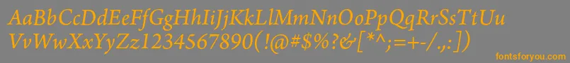 フォントArnoproItalic10pt – オレンジの文字は灰色の背景にあります。