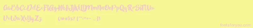 InBlossomVintage-Schriftart – Rosa Schriften auf gelbem Hintergrund