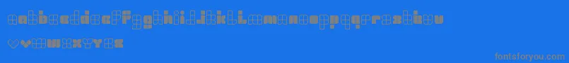 Universalisme Font – Gray Fonts on Blue Background