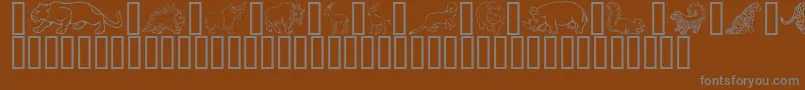 Шрифт GeWildKingdomPToZ – серые шрифты на коричневом фоне