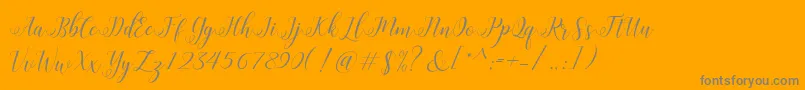 HisteriaScriptDemo-Schriftart – Graue Schriften auf orangefarbenem Hintergrund