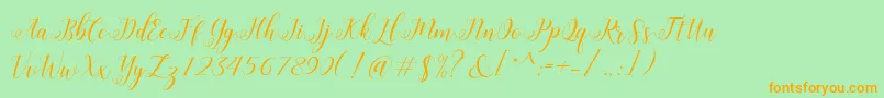 Шрифт HisteriaScriptDemo – оранжевые шрифты на зелёном фоне