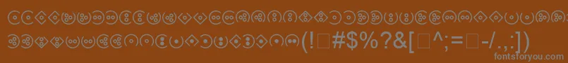 フォントDliLightscript – 茶色の背景に灰色の文字