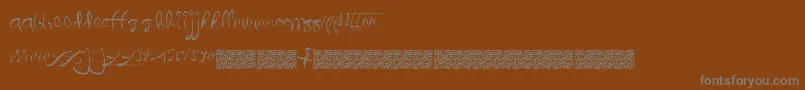 Quicklywrite-Schriftart – Graue Schriften auf braunem Hintergrund