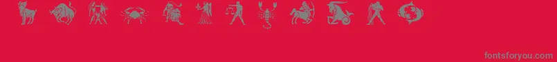 Czcionka Slzodiacstencils – szare czcionki na czerwonym tle