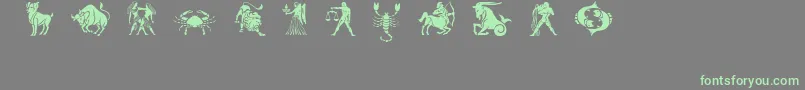 フォントSlzodiacstencils – 灰色の背景に緑のフォント