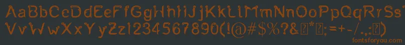 Шрифт Fernanta – коричневые шрифты на чёрном фоне