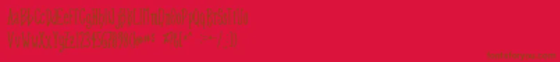 Sanddollar Font – Brown Fonts on Red Background