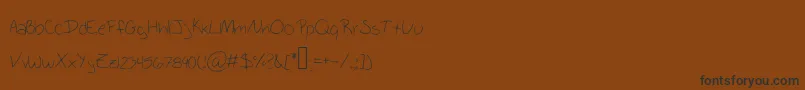 SchoolWriting Font – Black Fonts on Brown Background