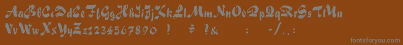 フォントFatscript – 茶色の背景に灰色の文字