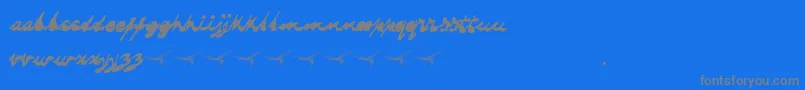 Dragonflysaji-Schriftart – Graue Schriften auf blauem Hintergrund