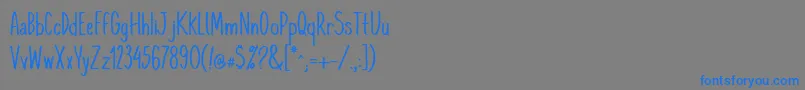 フォントKomixcon – 灰色の背景に青い文字
