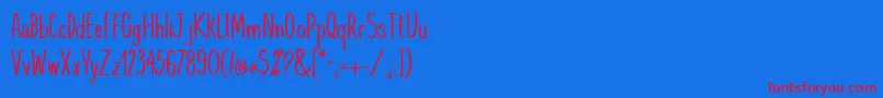 Komixcon Font – Red Fonts on Blue Background