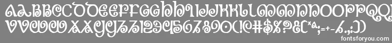 フォントTheshirebc – 灰色の背景に白い文字